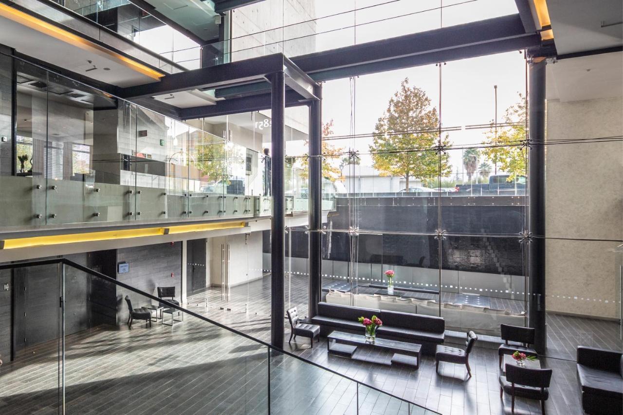 Отель Wyndham Santiago Pettra Экстерьер фото Interior of the new building