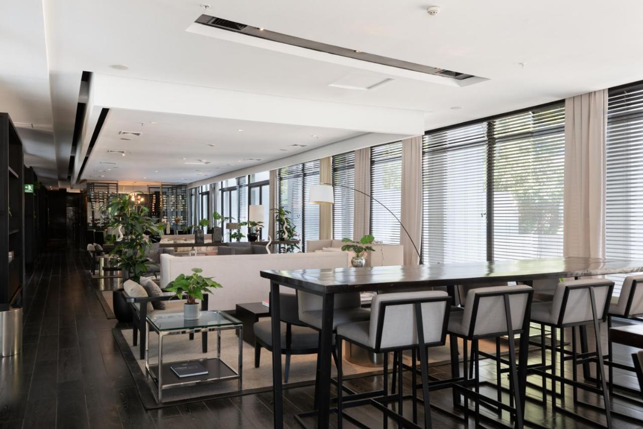 Отель Wyndham Santiago Pettra Экстерьер фото The lounge at the airport