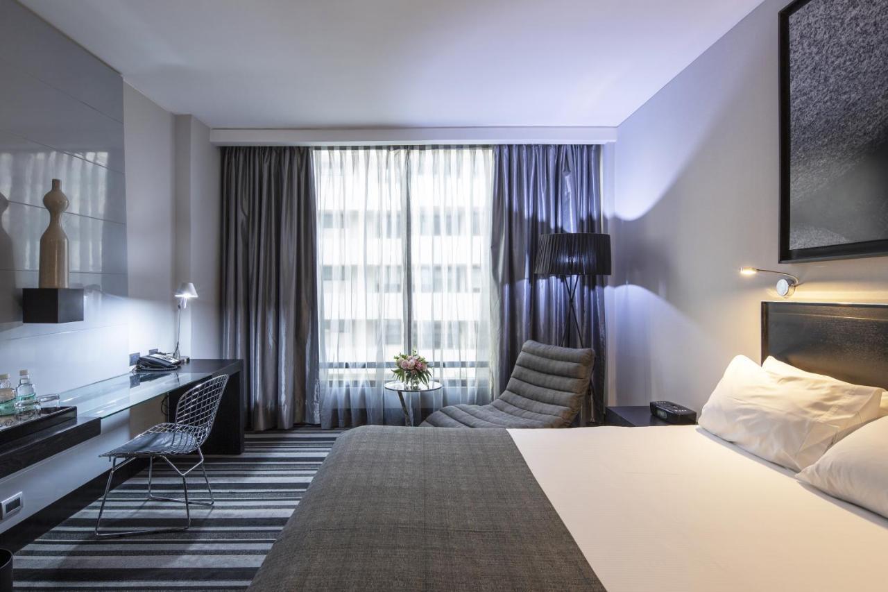 Отель Wyndham Santiago Pettra Экстерьер фото A room at the hotel