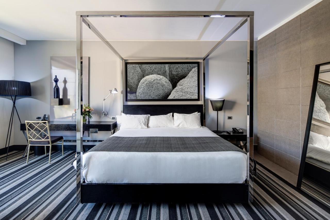 Отель Wyndham Santiago Pettra Экстерьер фото A room at the hotel
