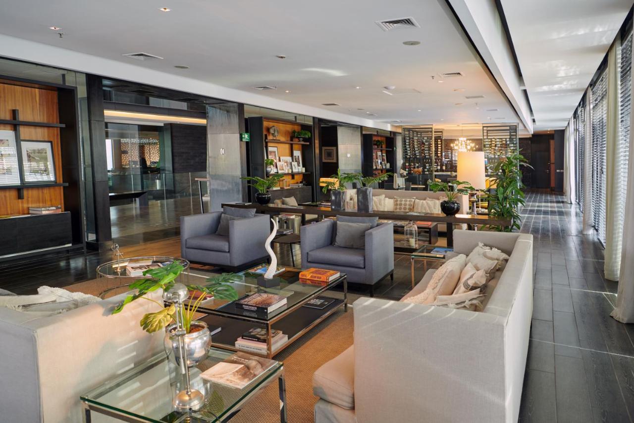 Отель Wyndham Santiago Pettra Экстерьер фото The lounge at the airport