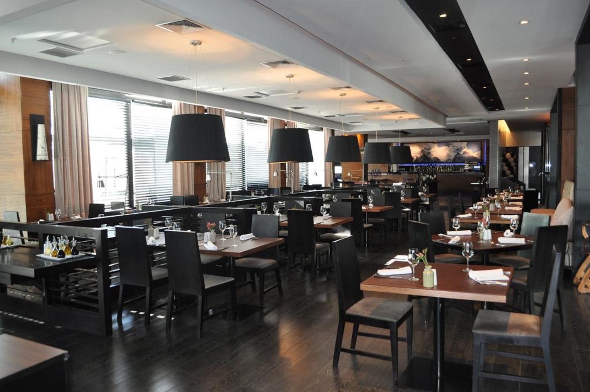 Отель Wyndham Santiago Pettra Экстерьер фото The interior of the restaurant