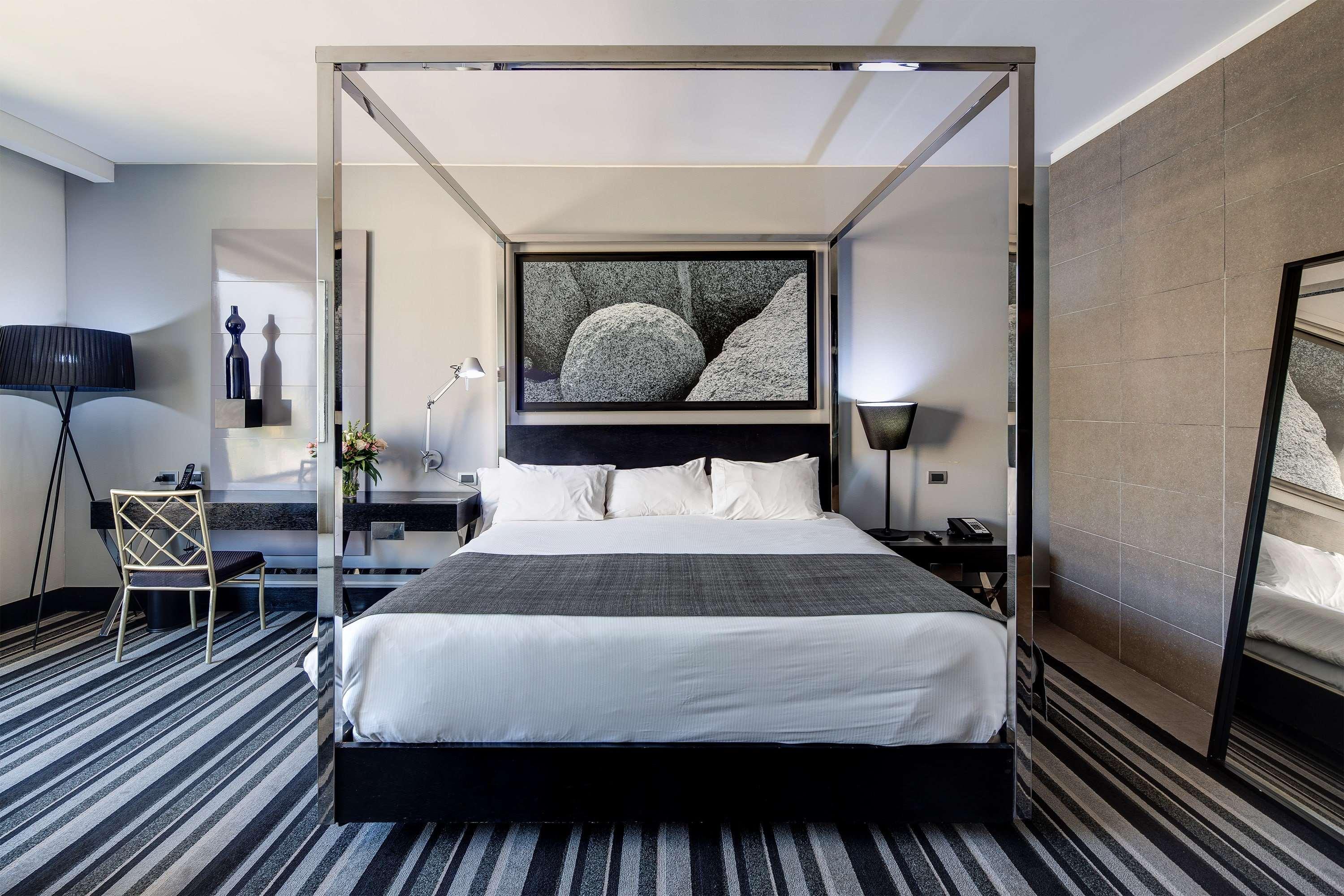 Отель Wyndham Santiago Pettra Экстерьер фото A room at the hotel