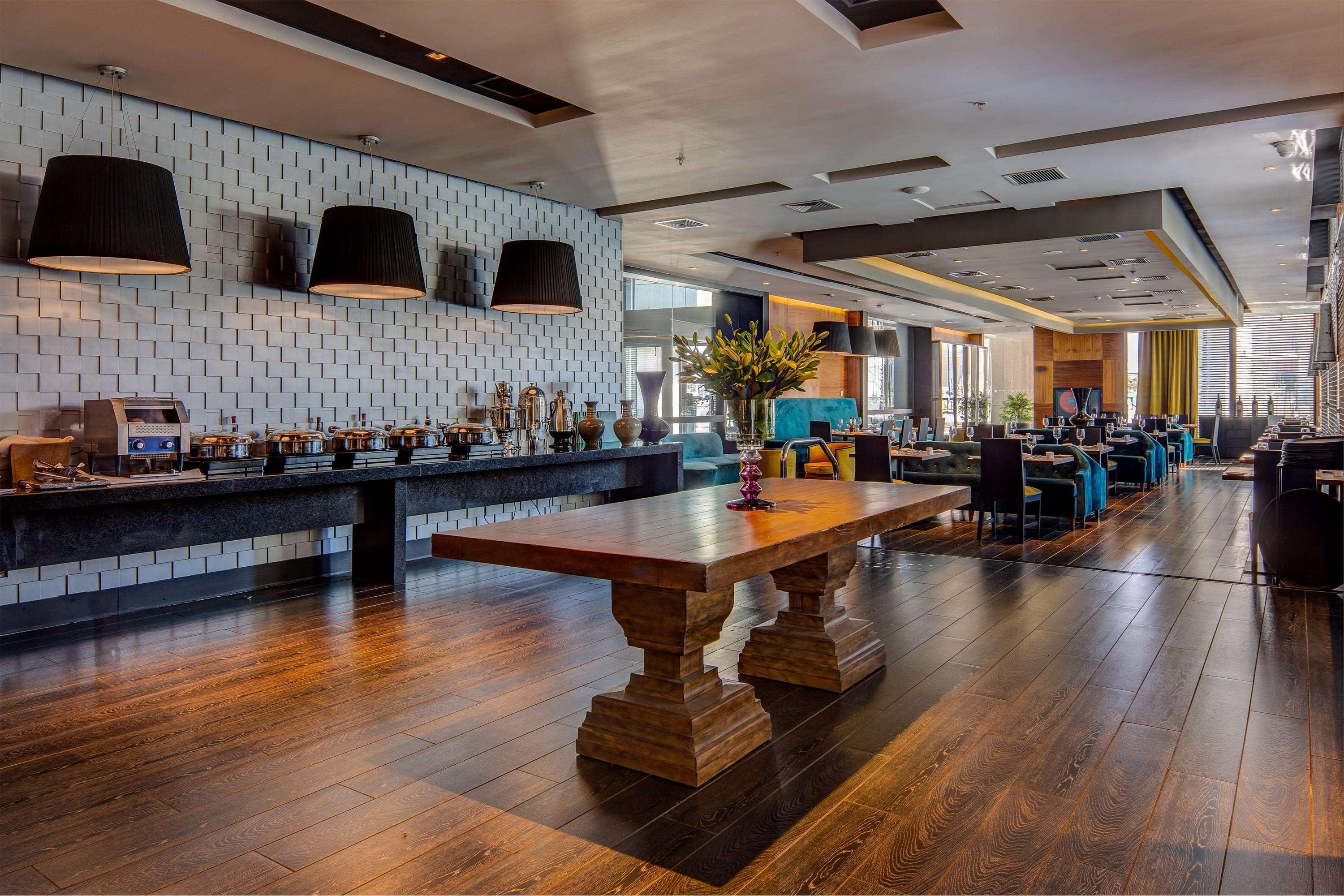 Отель Wyndham Santiago Pettra Экстерьер фото The lounge at the airport