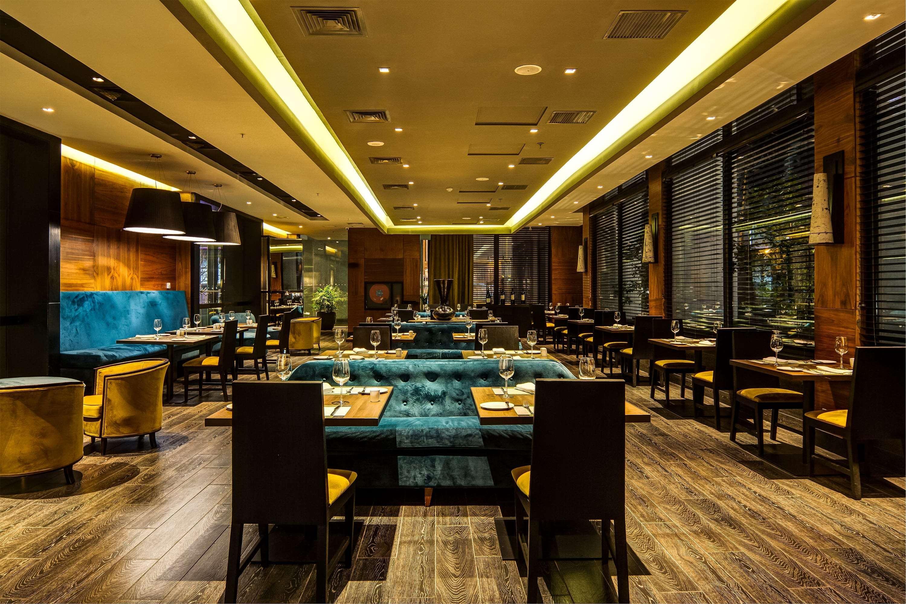 Отель Wyndham Santiago Pettra Экстерьер фото Restaurant interior