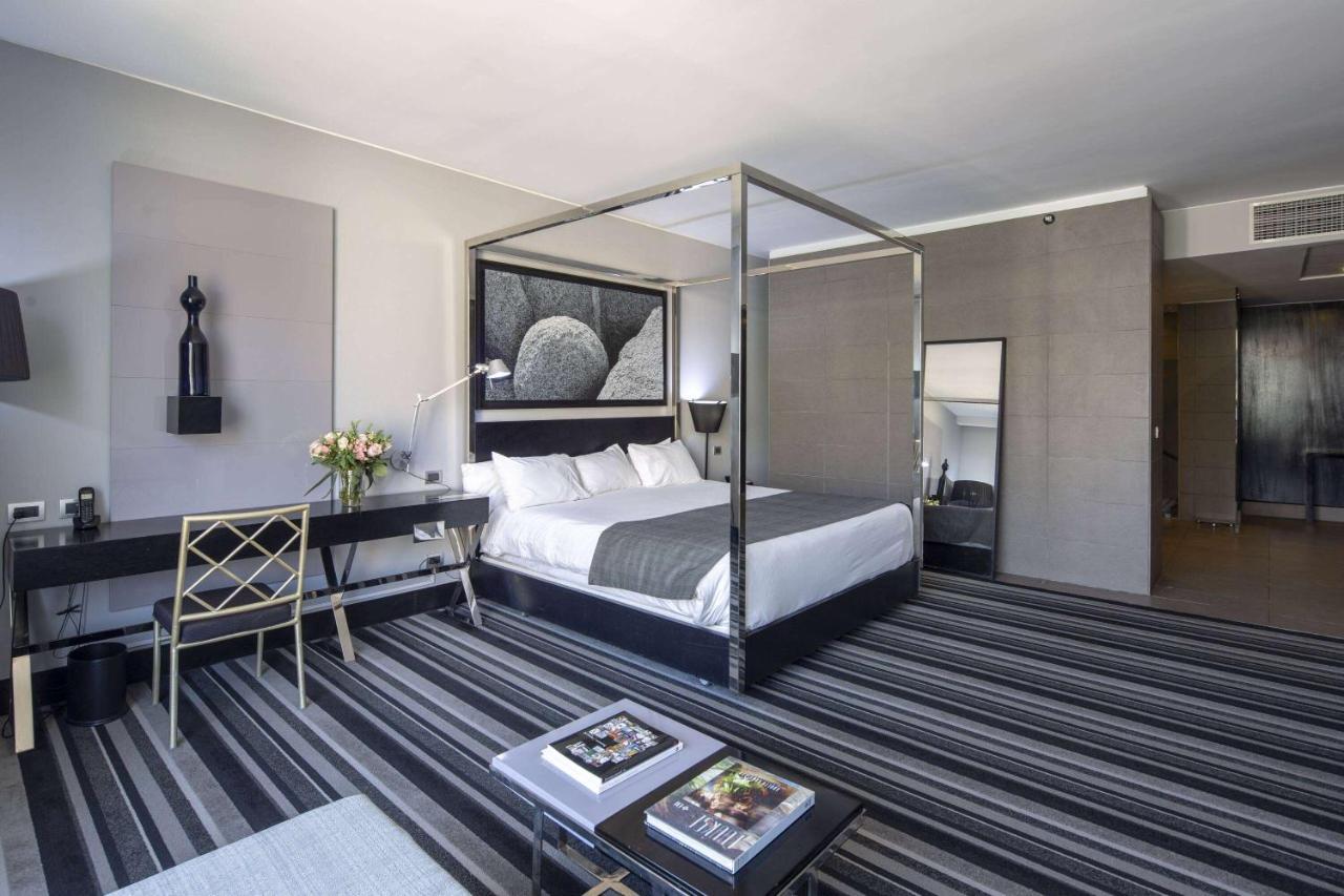 Отель Wyndham Santiago Pettra Экстерьер фото A room at the Hotel Indigo Paris Montmartre