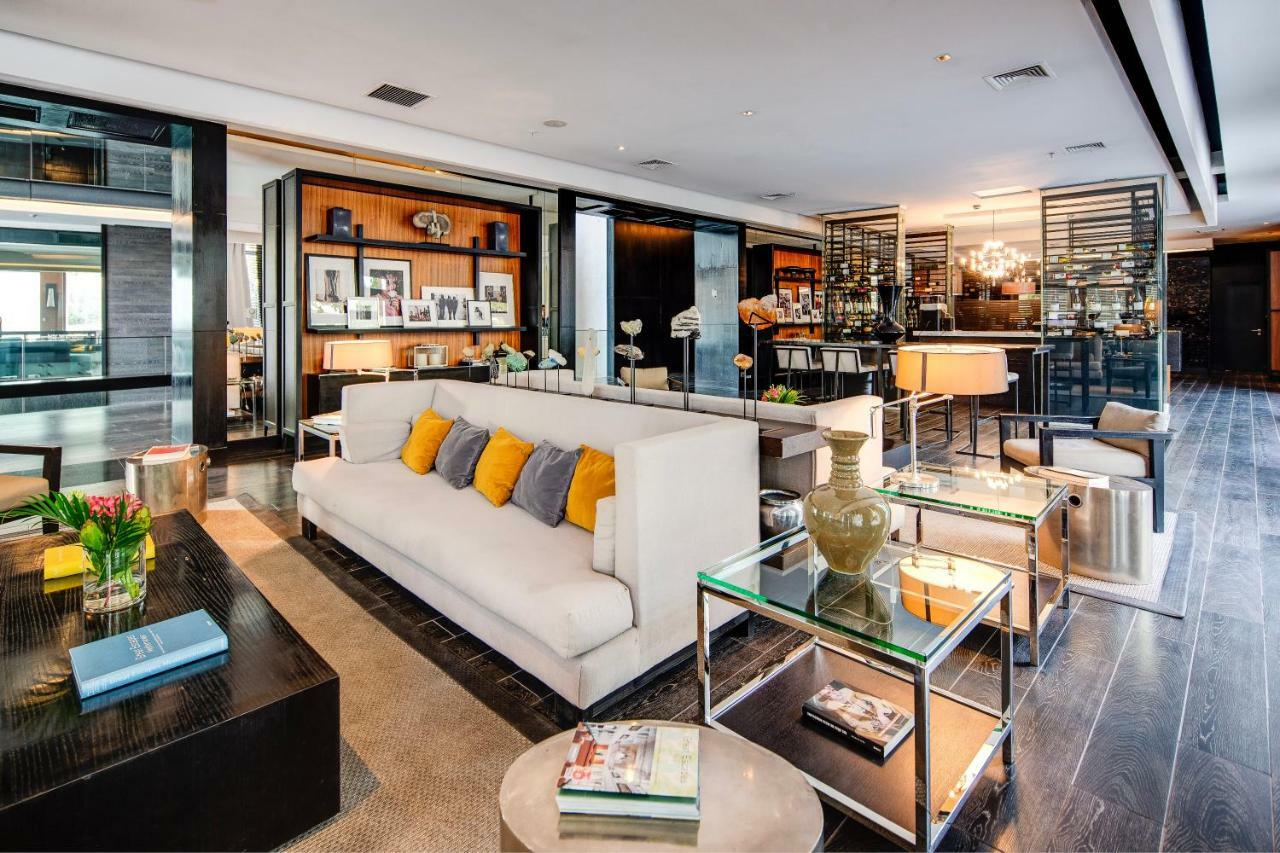 Отель Wyndham Santiago Pettra Экстерьер фото The interior of the hotel
