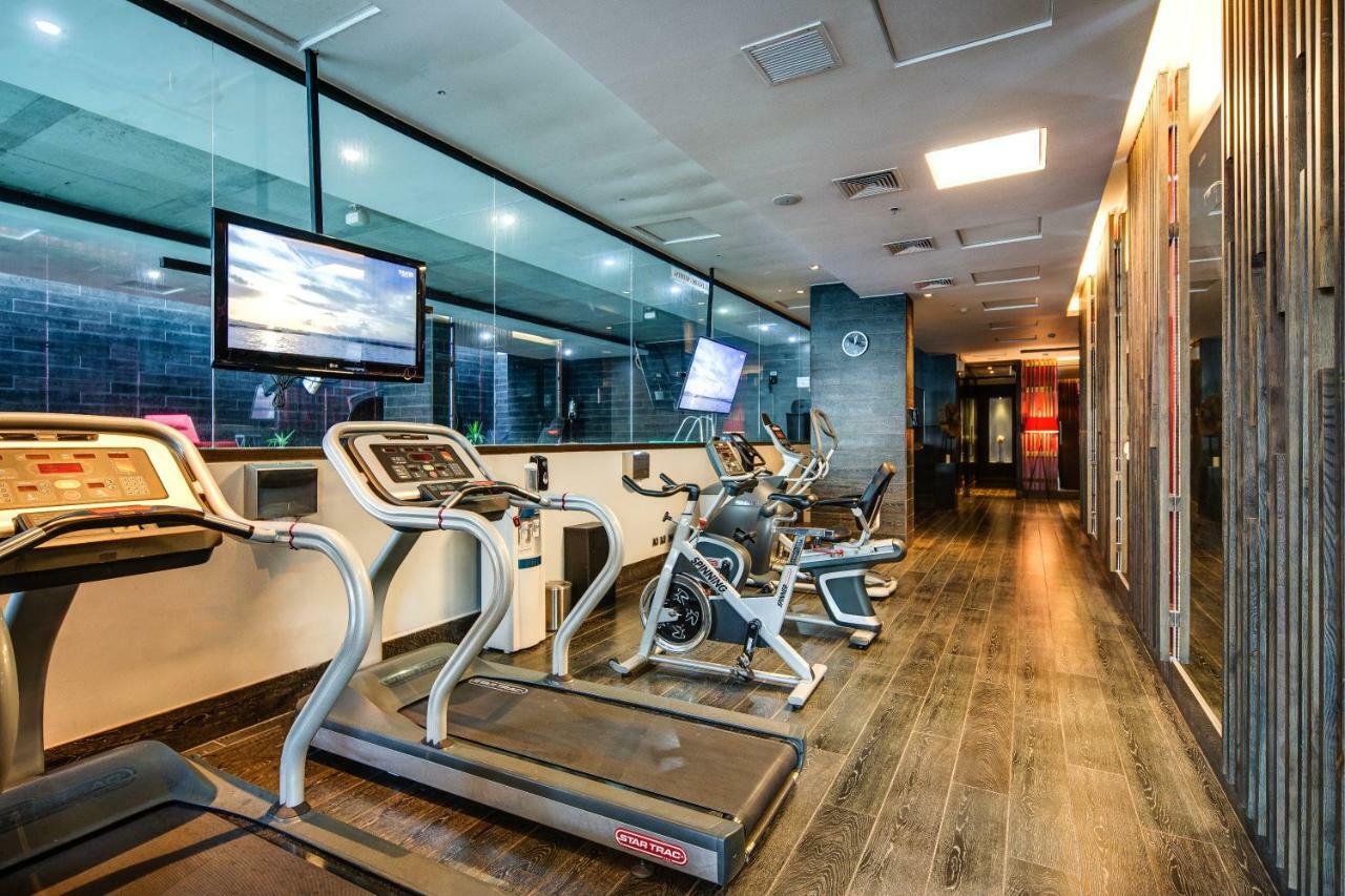 Отель Wyndham Santiago Pettra Экстерьер фото The gym at the hotel